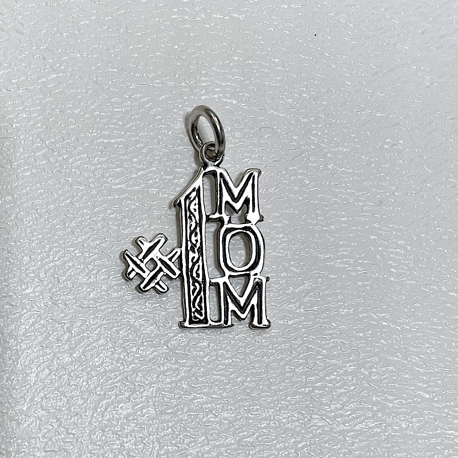 Charm on white background