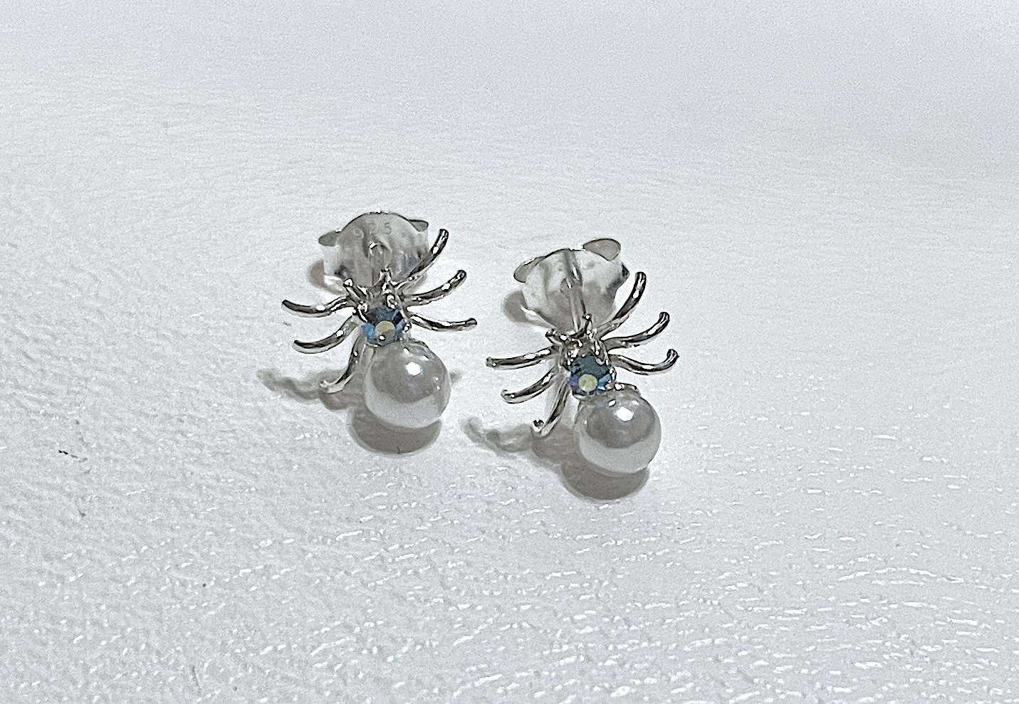 Earrings on white background