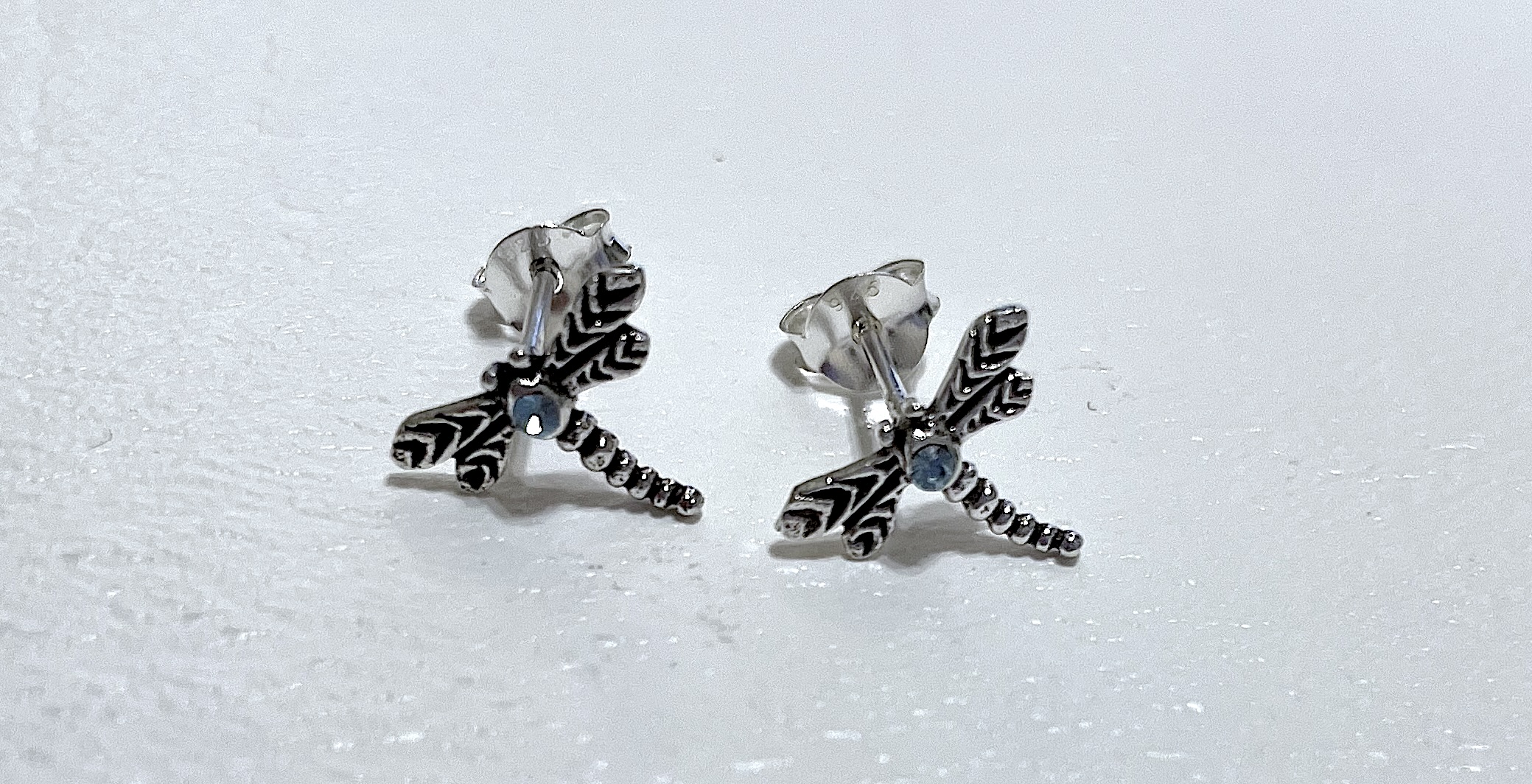 Earrings on white background