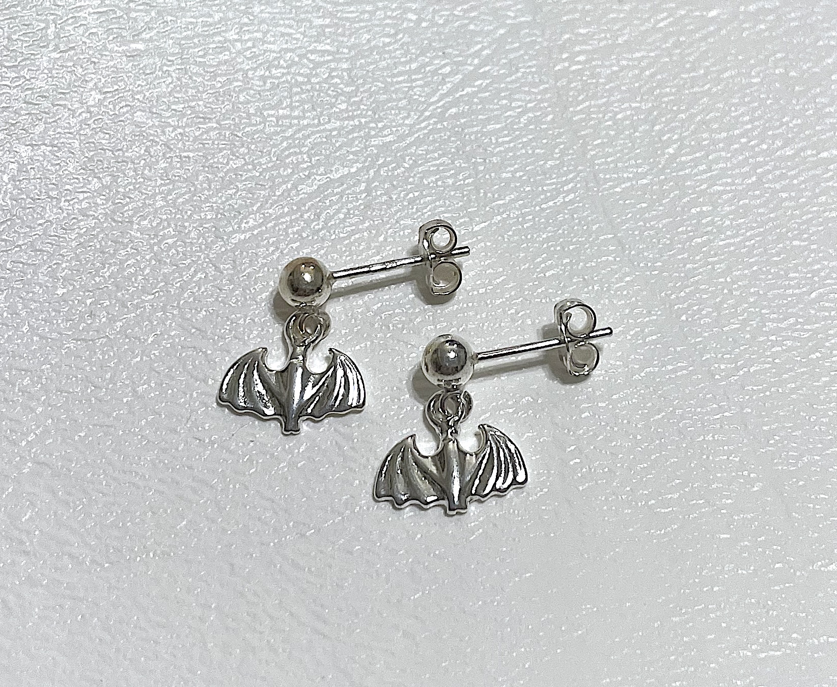 Earrings on white background
