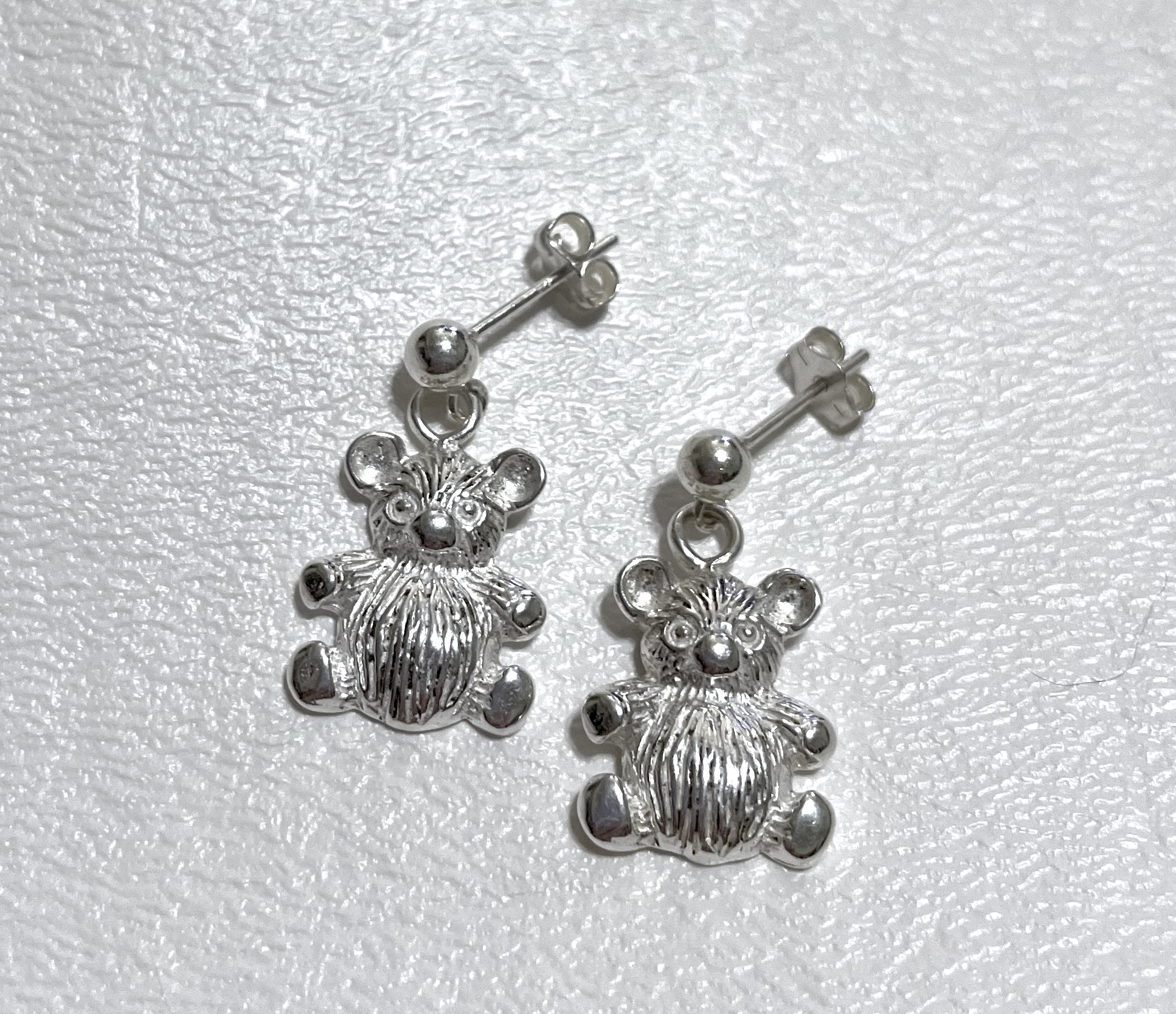 Earrings on white background