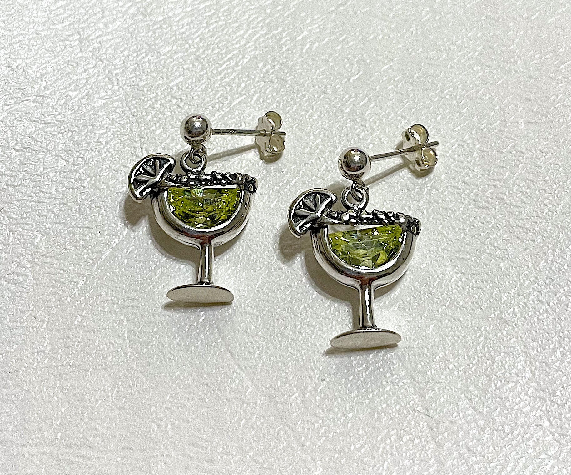 Earrings on white background