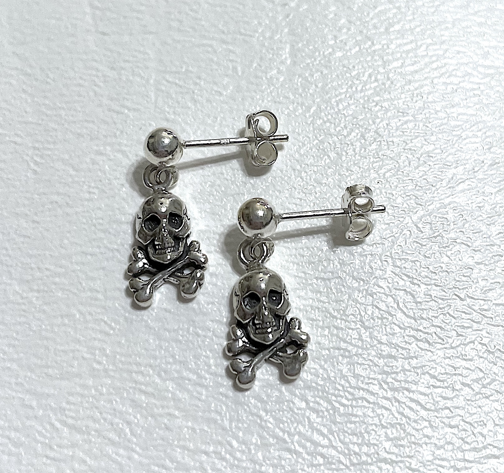 Earrings on white background