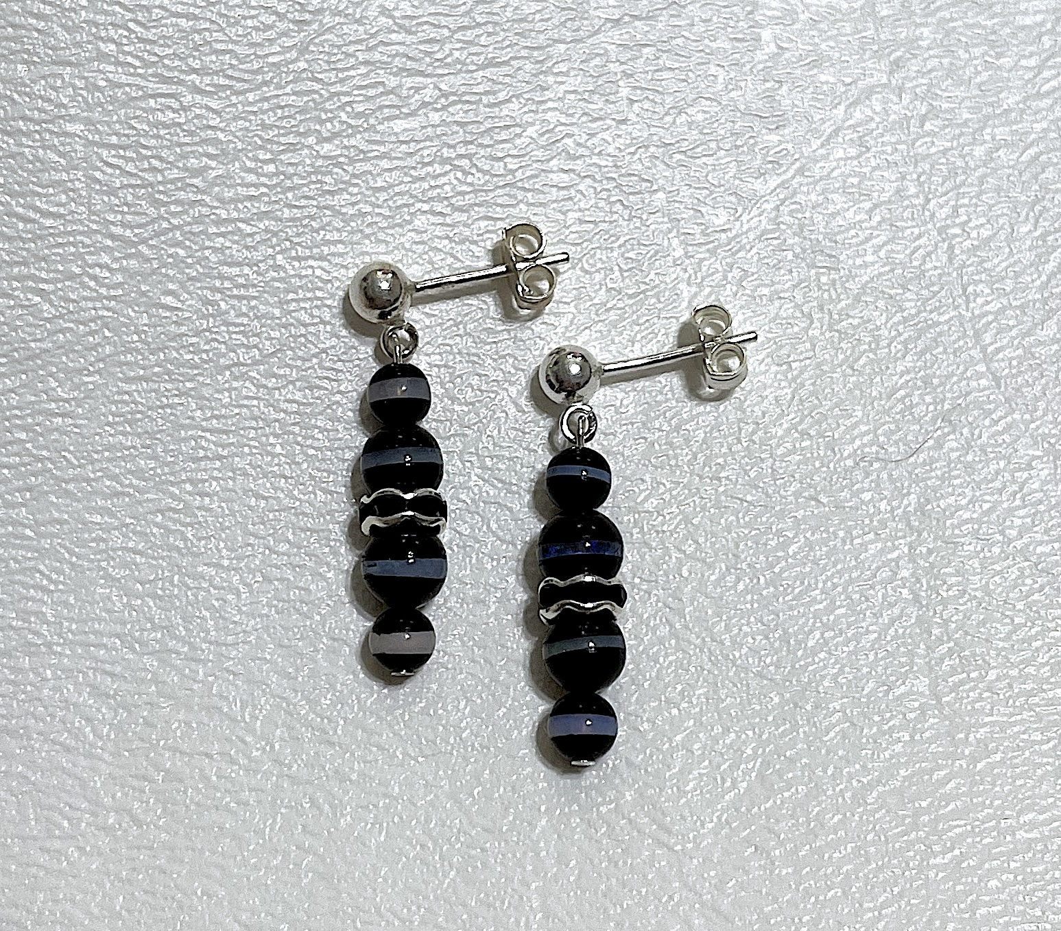 Earrings on white background