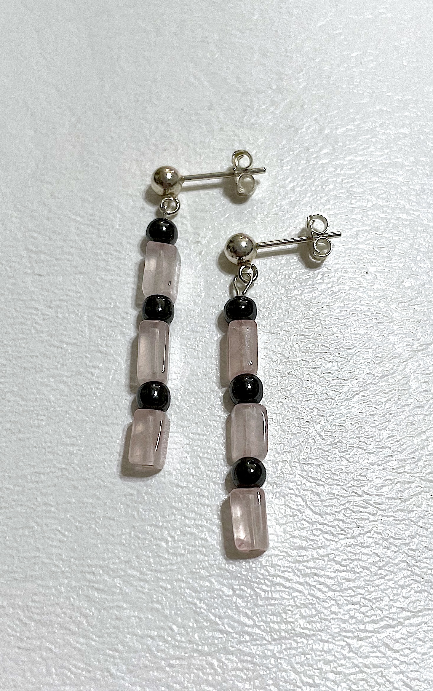 Earrings on white background