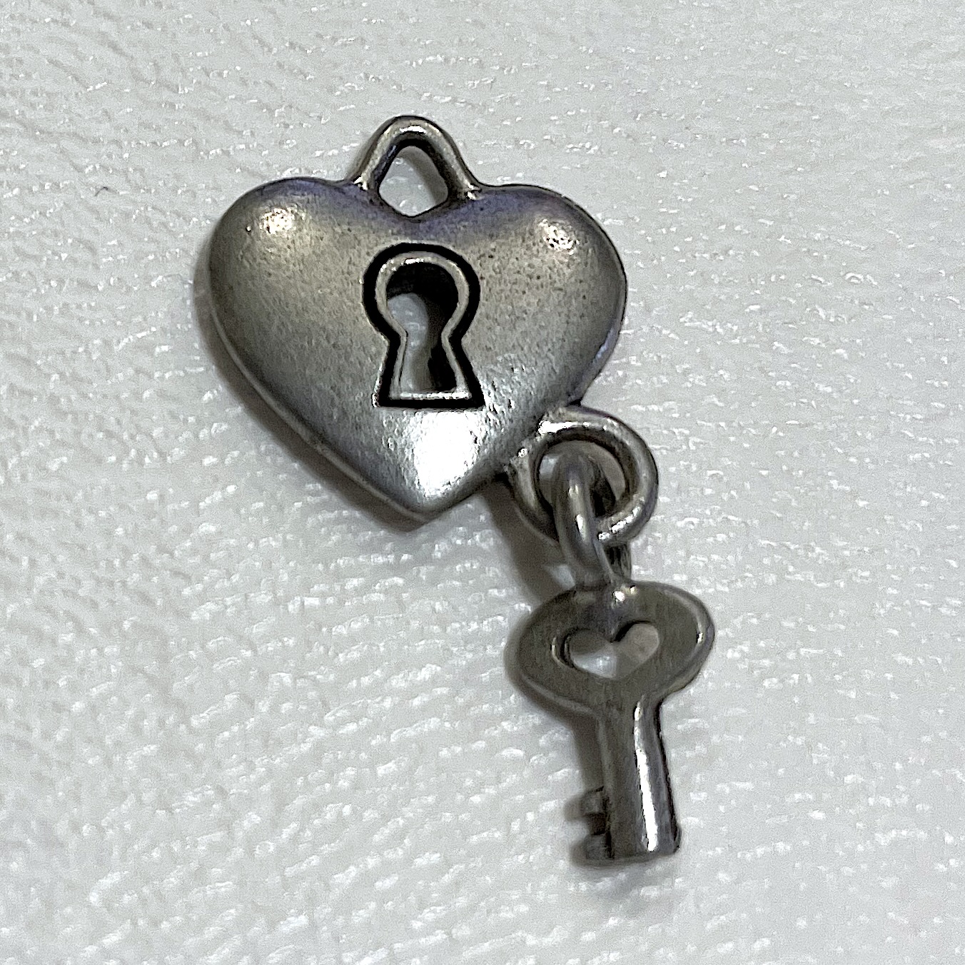 Charm on white background