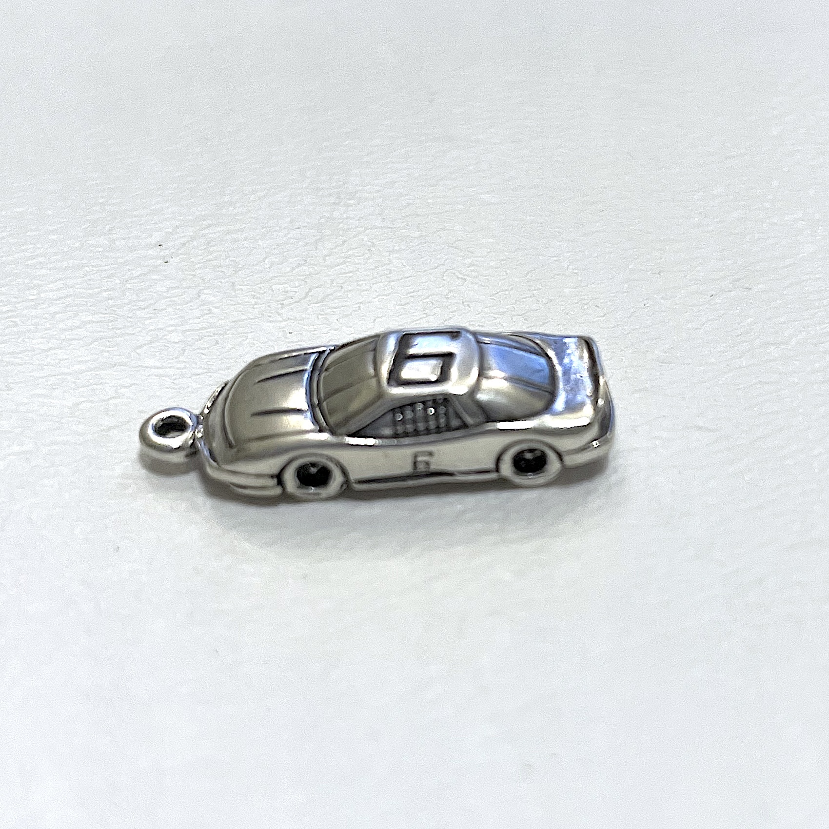 Charm on white background