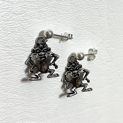 Earrings on white background