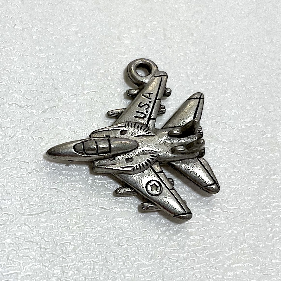 Charm on white background