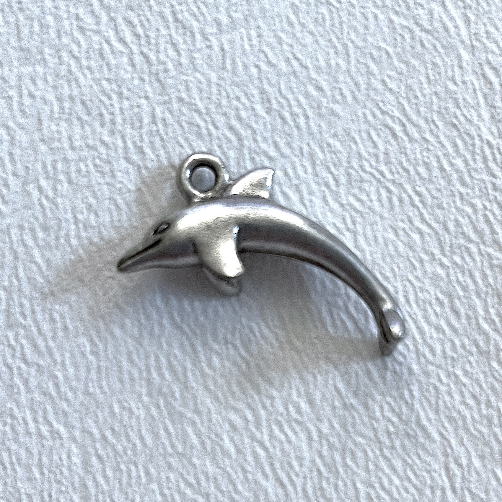 Charm on white background