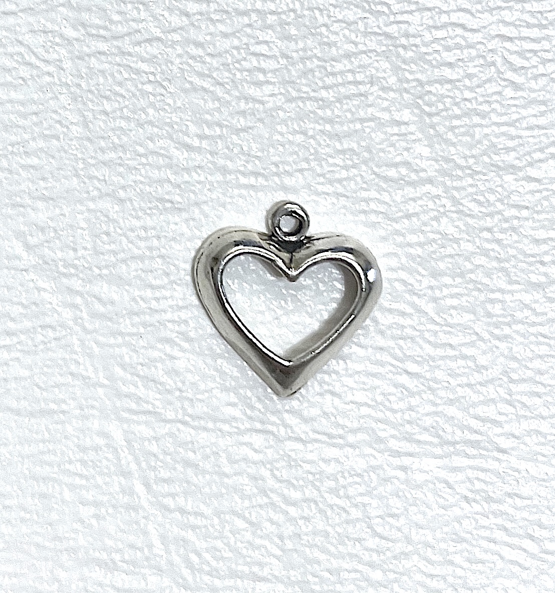 Charm on white background
