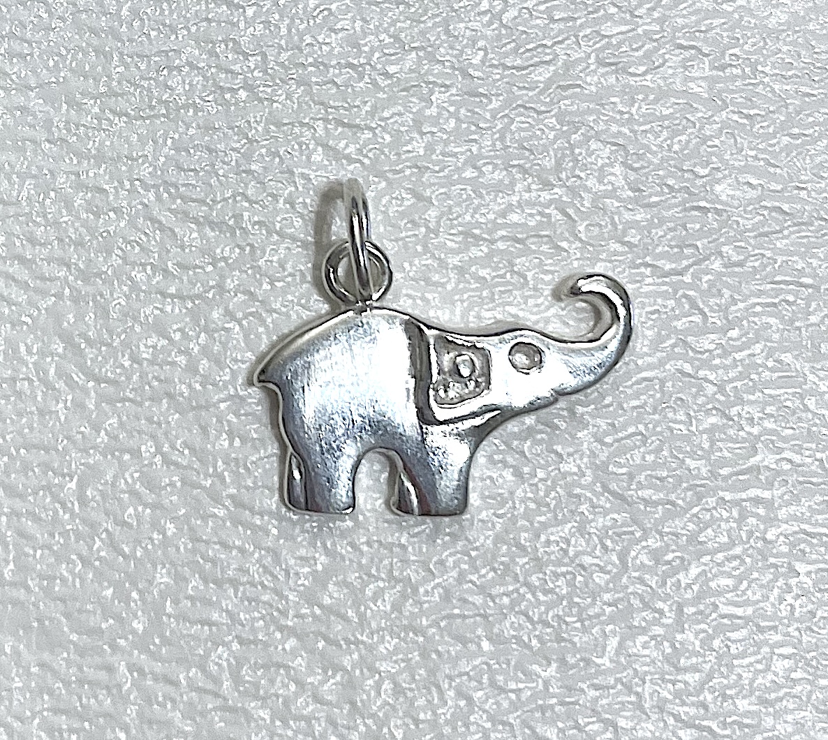 Charm on white background